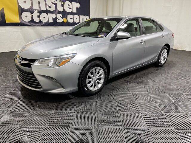 2015 Toyota Camry for sale at Monster Motors in Michigan Center MI