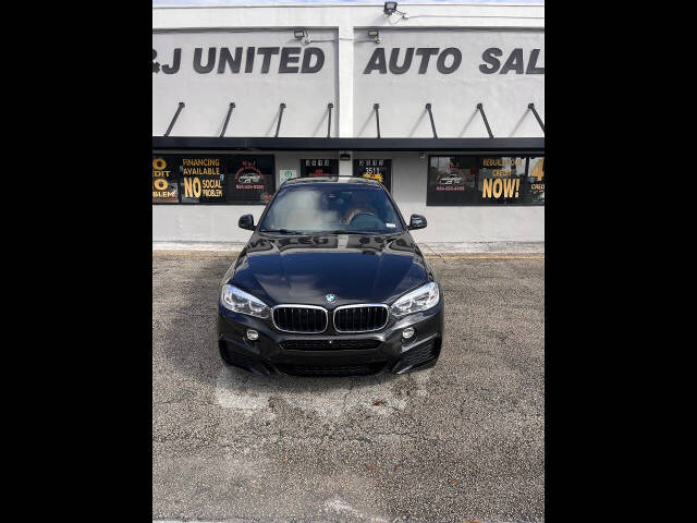 2019 BMW X6 for sale at M & J UNITED AUTO SALES in LAUDERDALE LAKES, FL