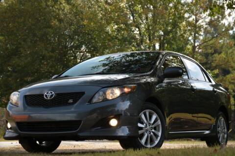 2010 Toyota Corolla for sale at Carma Auto Group in Duluth GA