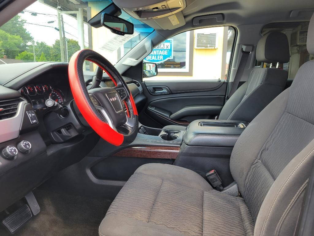 2016 GMC Yukon for sale at DAGO'S AUTO SALES LLC in Dalton, GA