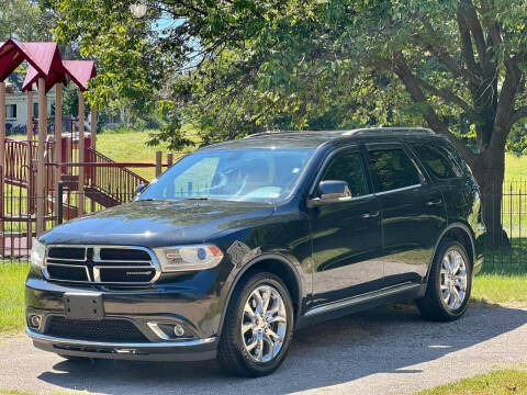 2014 Dodge Durango for sale at ARCH AUTO SALES in Saint Louis MO