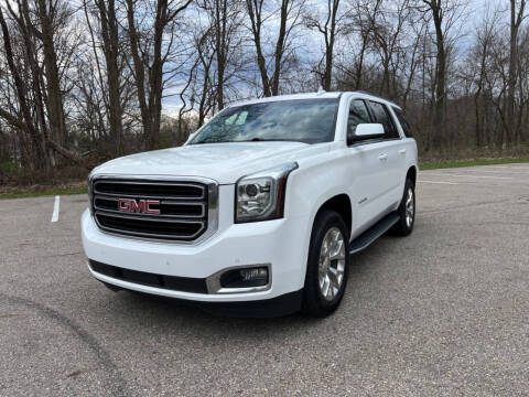 2020 GMC Yukon for sale at Rombaugh's Auto Sales in Battle Creek MI