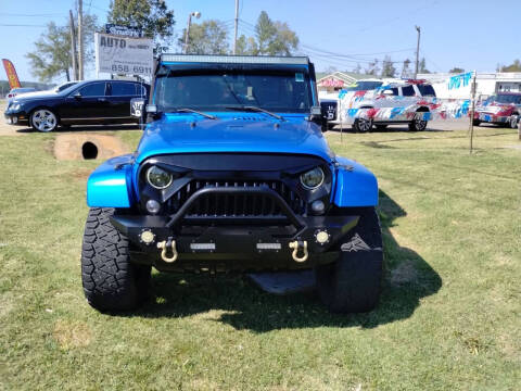 2014 Jeep Wrangler Unlimited for sale at AUTOPLEX 528 LLC in Huntsville AL