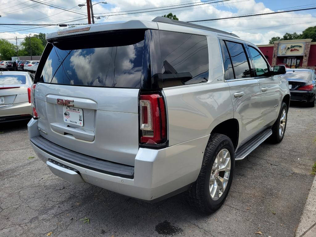 2016 GMC Yukon for sale at DAGO'S AUTO SALES LLC in Dalton, GA