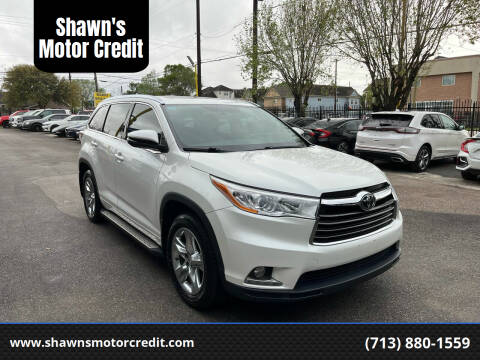 2015 Toyota Highlander for sale at Shawn's Motor Credit in Houston TX