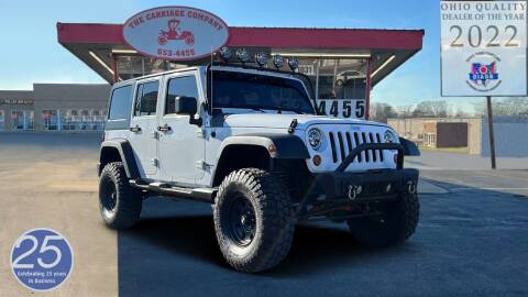 2013 Jeep Wrangler Unlimited for sale at The Carriage Company in Lancaster OH