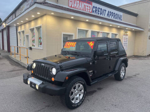 2014 Jeep Wrangler Unlimited for sale at Suarez Auto Sales in Port Huron MI