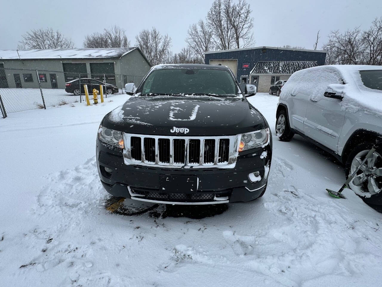 2013 Jeep Grand Cherokee for sale at Platinum Motors in Holland, MI