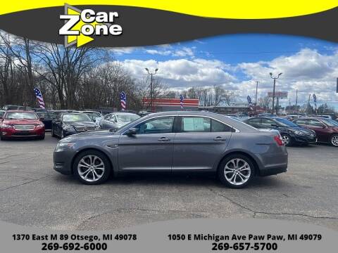 2013 Ford Taurus for sale at Car Zone in Otsego MI