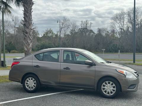2017 Nissan Versa for sale at Louie's Auto Sales in Leesburg FL