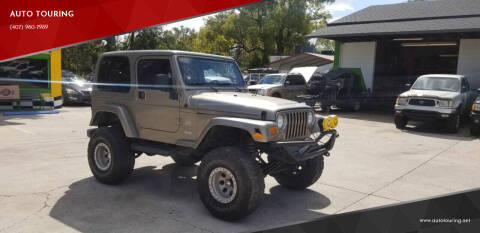 1997 Jeep Wrangler for sale at AUTO TOURING in Orlando FL