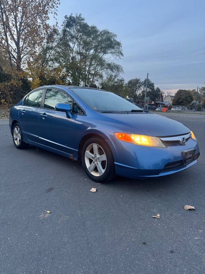 2006 Honda Civic for sale at H & H AUTO GROUP in Detroit, MI