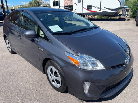 2015 Toyota Prius for sale at BERKENKOTTER MOTORS in Brighton CO