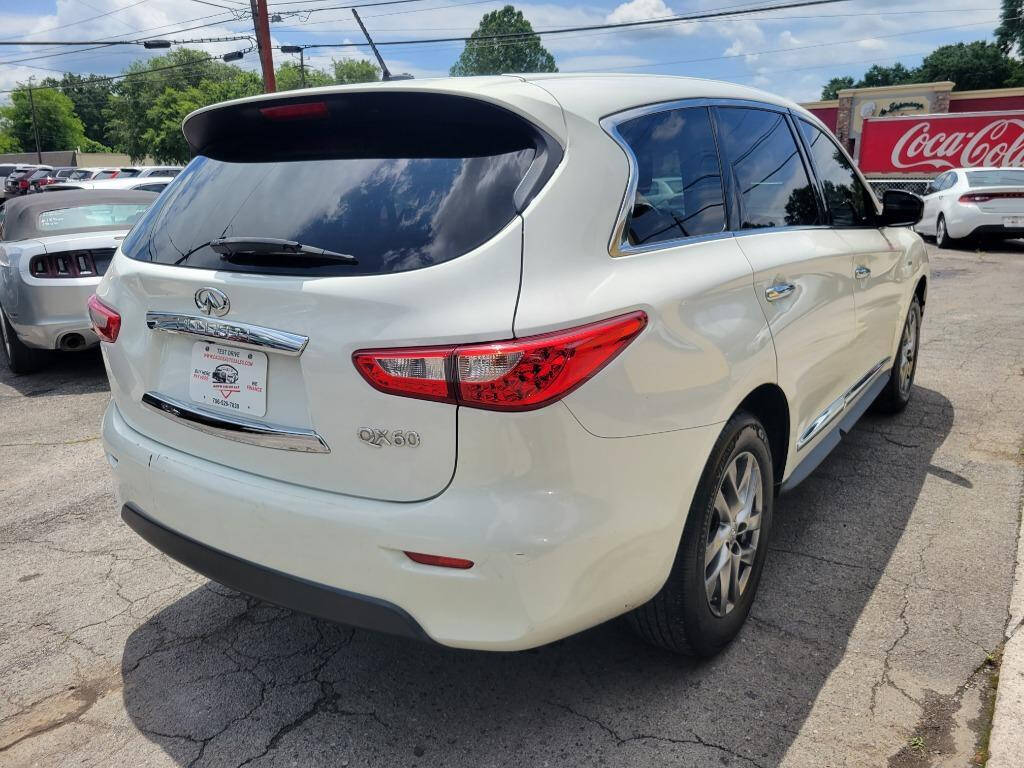 2014 INFINITI QX60 for sale at DAGO'S AUTO SALES LLC in Dalton, GA