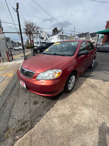 2006 Toyota Corolla for sale at A & J AUTO GROUP in New Bedford MA