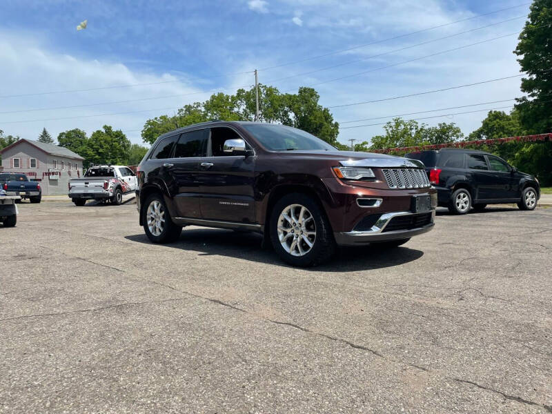 2014 Jeep Grand Cherokee for sale at Rombaugh's Auto Sales in Battle Creek MI