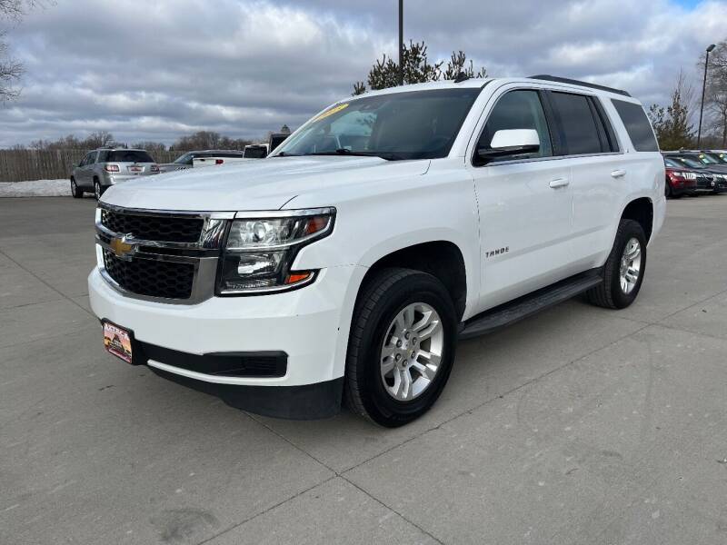 2015 Chevrolet Tahoe for sale at Azteca Auto Sales LLC in Des Moines IA