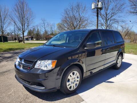 2016 Dodge Grand Caravan for sale at COOP'S AFFORDABLE AUTOS LLC in Otsego MI