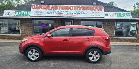 2012 Kia Sportage for sale at CARRR AUTOMOTIVE GROUP INC in Reading MI