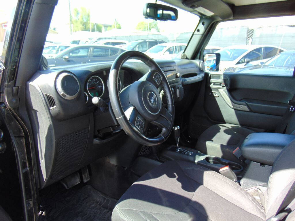 2014 Jeep Wrangler Unlimited for sale at Avalanche Auto Sales in Denver, CO