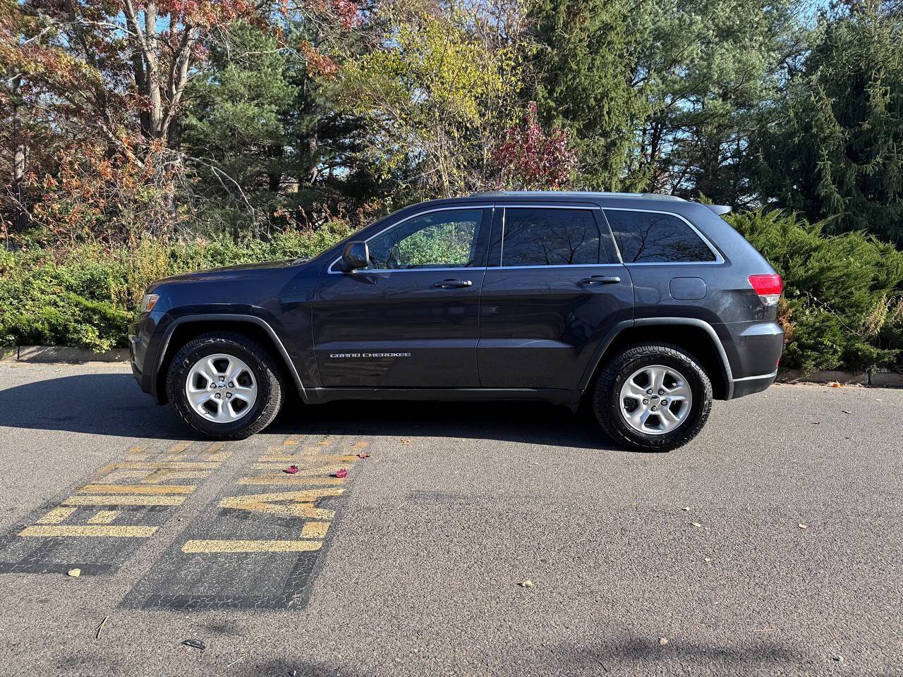 2014 Jeep Grand Cherokee for sale at Paragon Auto Group in Toms River, NJ