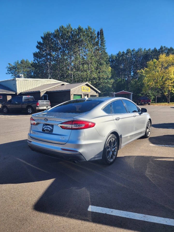 2020 Ford Fusion for sale at Auto Hunter in Webster, WI