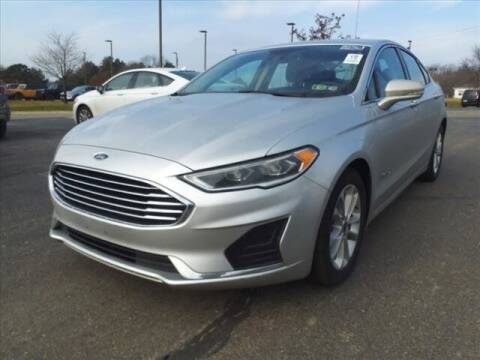 2019 Ford Fusion Hybrid for sale at Szott Ford in Holly MI