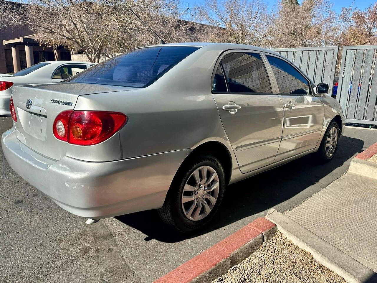 2003 Toyota Corolla for sale at HUDSONS AUTOS in Gilbert, AZ