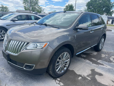 2012 Lincoln MKX for sale at HEDGES USED CARS in Carleton MI