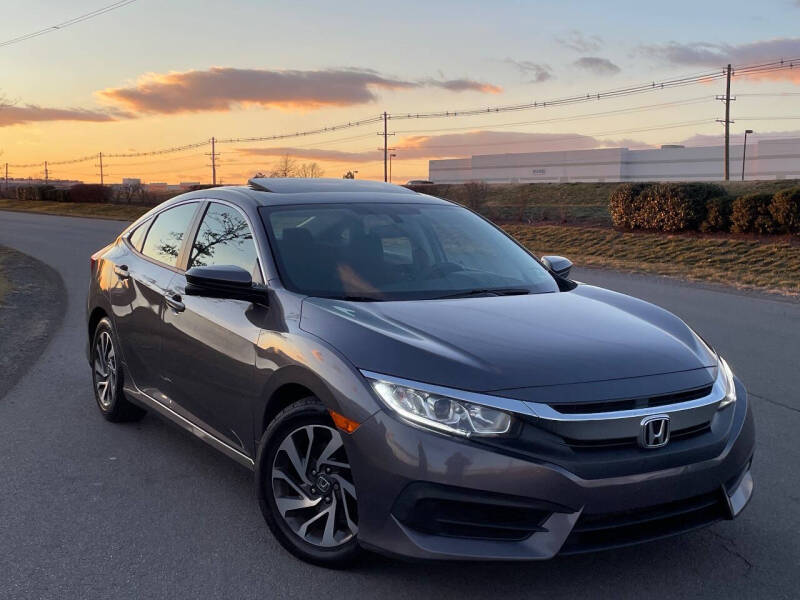 2018 Honda Civic for sale at BOOST MOTORS LLC in Sterling VA