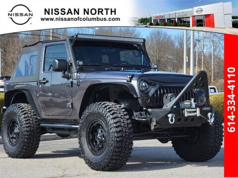 2014 Jeep Wrangler for sale at Auto Center of Columbus in Columbus OH