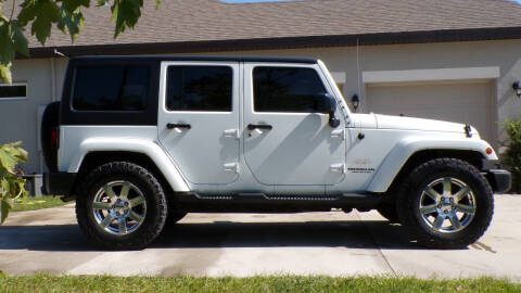 2015 Jeep Wrangler Unlimited for sale at G and G AUTO SALES in Merrill WI