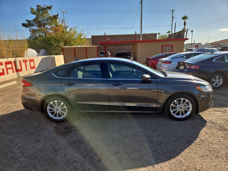 2020 Ford Fusion for sale at CROSSROADS AUTO CENTER in Casa Grande AZ