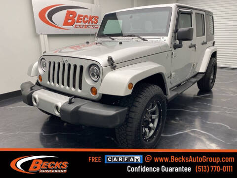 2011 Jeep Wrangler Unlimited for sale at Becks Auto Group in Mason OH