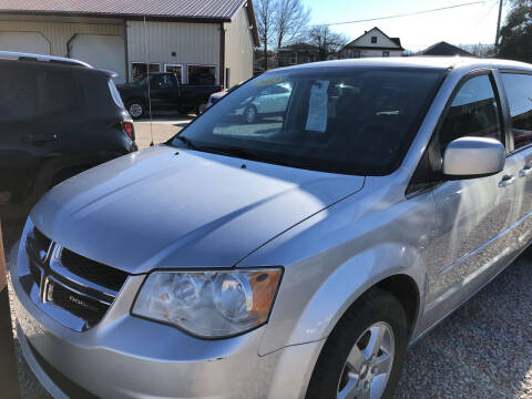 2012 Dodge Grand Caravan for sale at ADKINS PRE OWNED CARS LLC in Kenova WV