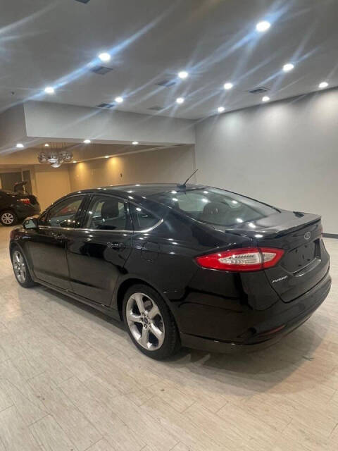 2014 Ford Fusion for sale at DRIVEN AUTO in Las Vegas, NV