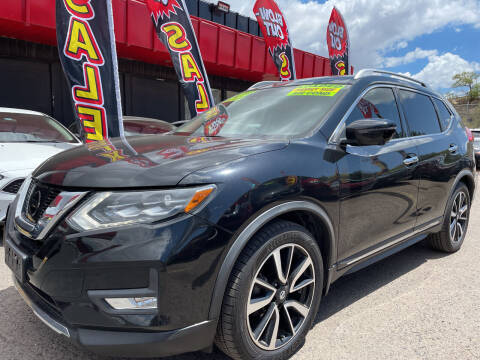 2017 Nissan Rogue for sale at Duke City Auto LLC in Gallup NM