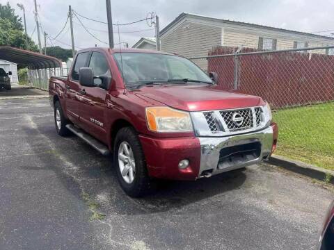 2014 Nissan Titan for sale at CE Auto Sales in Baytown TX