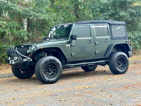 2011 Jeep Wrangler Unlimited for sale at H and S Auto Group in Canton GA