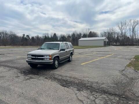 1999 Chevrolet Tahoe for sale at Caruzin Motors in Flint MI