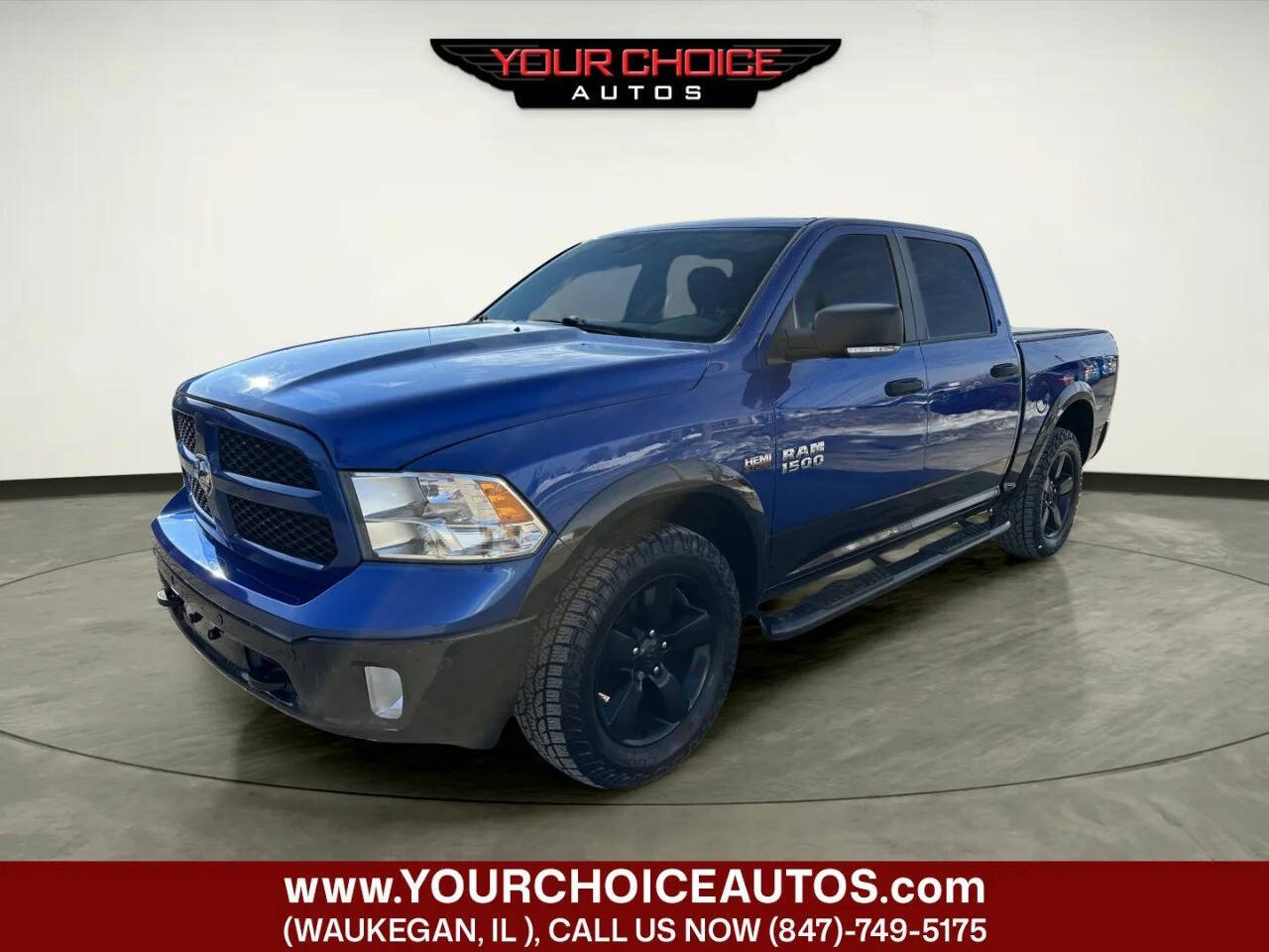 2015 RAM 1500 Outdoorsman 4x4 4dr Crew Cab 5.5 ft. SB Pickup's photo