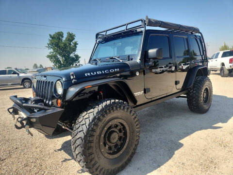 2012 Jeep Wrangler Unlimited for sale at Huntsman Wholesale LLC in Melba ID