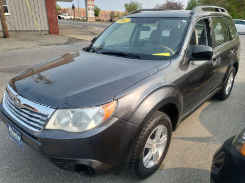 2012 Subaru Forester for sale at Howe's Auto Sales in Lowell MA