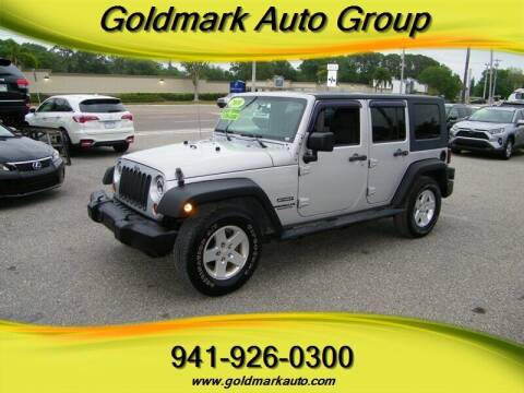 2010 Jeep Wrangler Unlimited for sale at Goldmark Auto Group in Sarasota FL