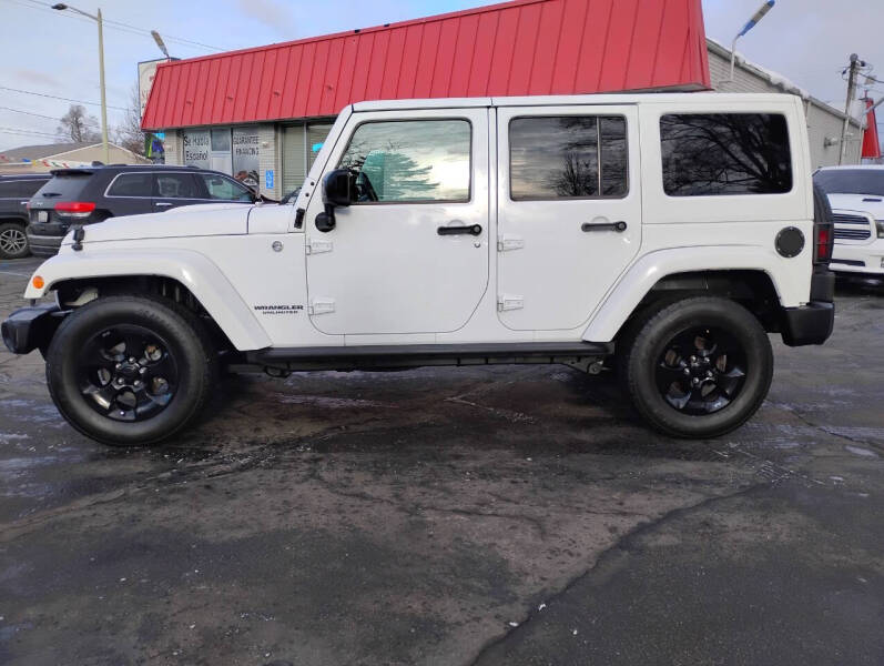 2015 Jeep Wrangler Unlimited for sale at Select Auto Group in Wyoming MI