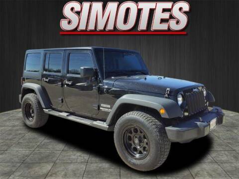 2014 Jeep Wrangler Unlimited for sale at SIMOTES MOTORS in Minooka IL