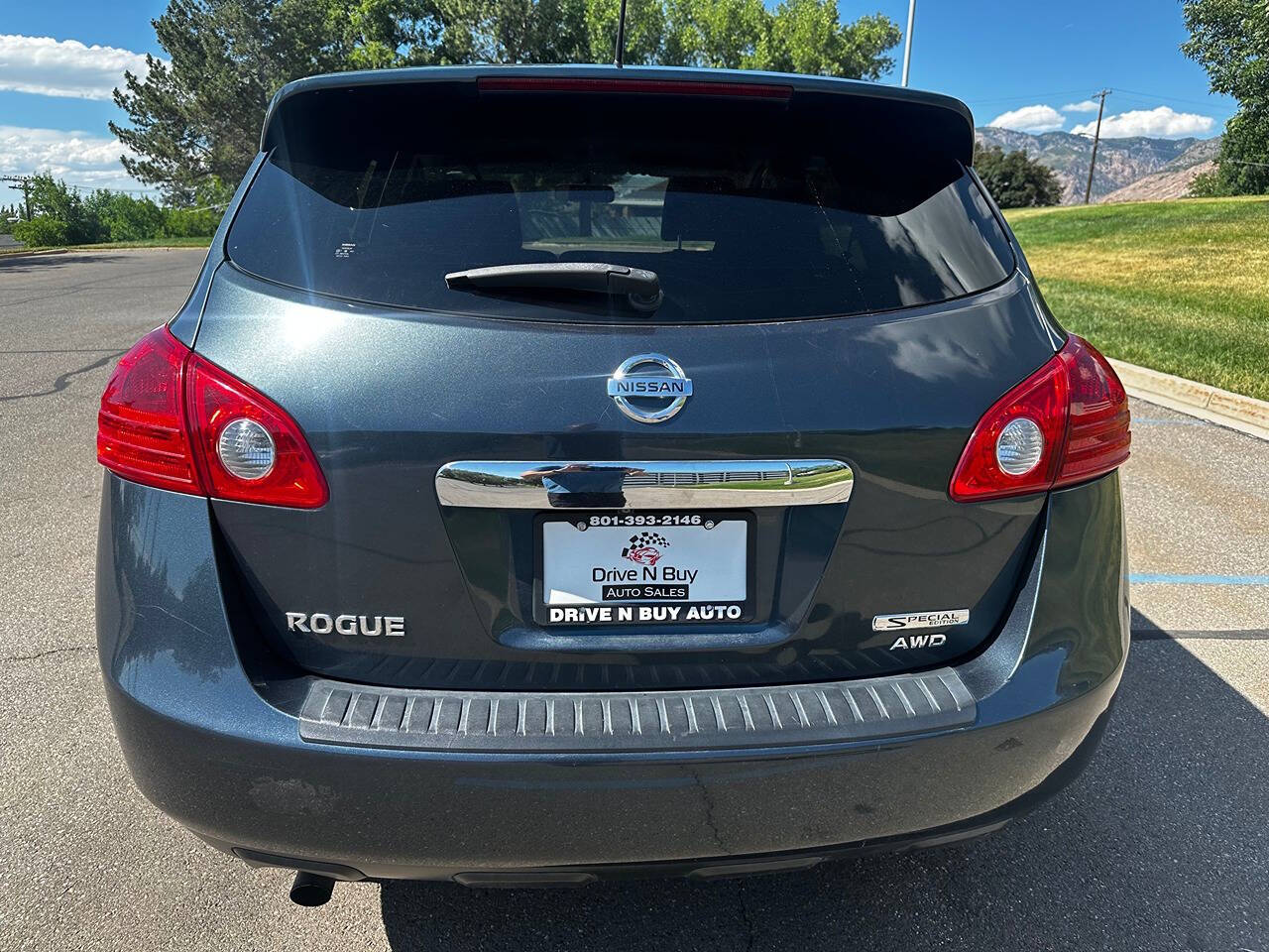 2013 Nissan Rogue for sale at DRIVE N BUY AUTO SALES in OGDEN, UT