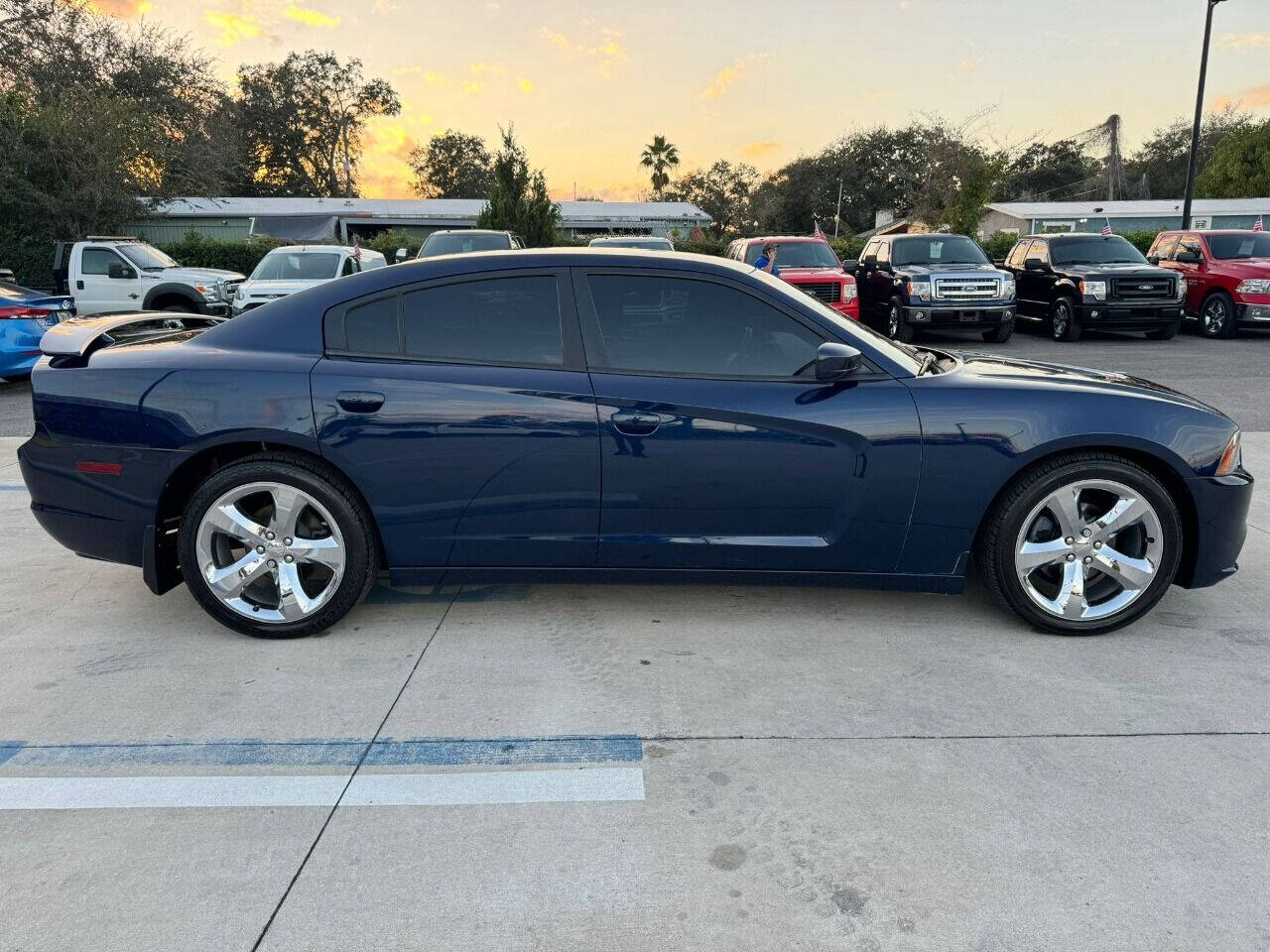 2014 Dodge Charger for sale at DJA Autos Center in Orlando, FL