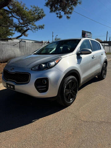 2017 Kia Sportage for sale at Mandingo's Automotive & Sales LLC in Snellville GA