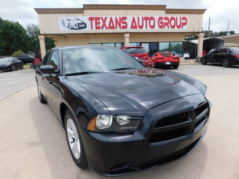2014 Dodge Charger for sale at Texans Auto Group in Spring TX